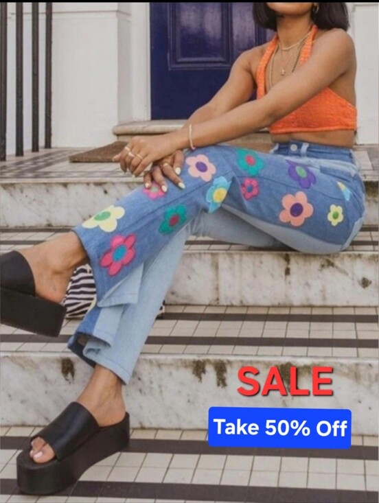 Denim - Blue Flare Jeans with Colorful Floral Side Panels. Size Small
